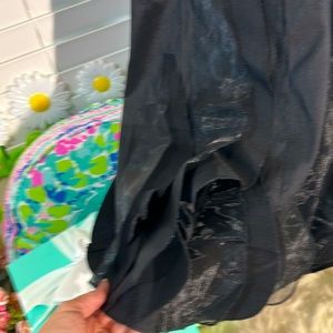 KM Collection fancy full petal hem stretchy satiny feel taffeta fabric